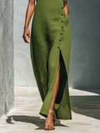 Vestido largo de lino con detalle de botones laterales y abertura alta para mujer.