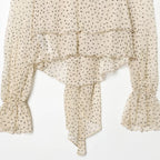 Polka Dot Tie-Neck Ruffle-Cuff Blouse