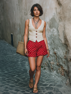 Gilet da donna in lino senza maniche con scollo a V e bottoni, stile boho chic estivo, con profonda scollatura e chiusura frontale.