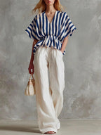 Ensemble top péplum col en V rayé et pantalon large
