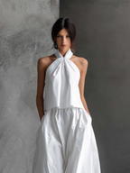 Maxikleid aus Baumwollleinen mit Neckholder, Bindeband und fließendem Rock