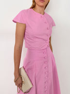 Conjunto de top corto con botones delanteros y falda midi de corte A