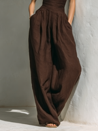 Leinen-Jumpsuit mit weitem Bein und tiefem V-Ausschnitt
