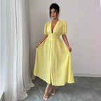 Gelbes V-Ausschnitt-Midi-Kleid mit Puffärmeln