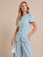 Completo composto da top sartoriale e pantaloni a palloncino