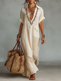 Linen Maxi Dress with Embroidered V-Neck and Pocket Detail