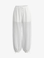 Weiße transparente Hosen mit weitem Bein und Kordelzug