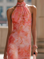 Pinkes Chiffon-Maxikleid mit Blumenmuster