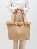 Handwoven Raffia Tote Bag with Fringe Trim