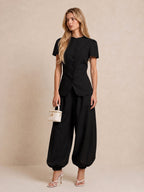 Completo composto da top sartoriale e pantaloni a palloncino