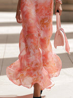 Pinkes Chiffon-Maxikleid mit Blumenmuster