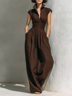 Leinen-Jumpsuit mit weitem Bein und tiefem V-Ausschnitt